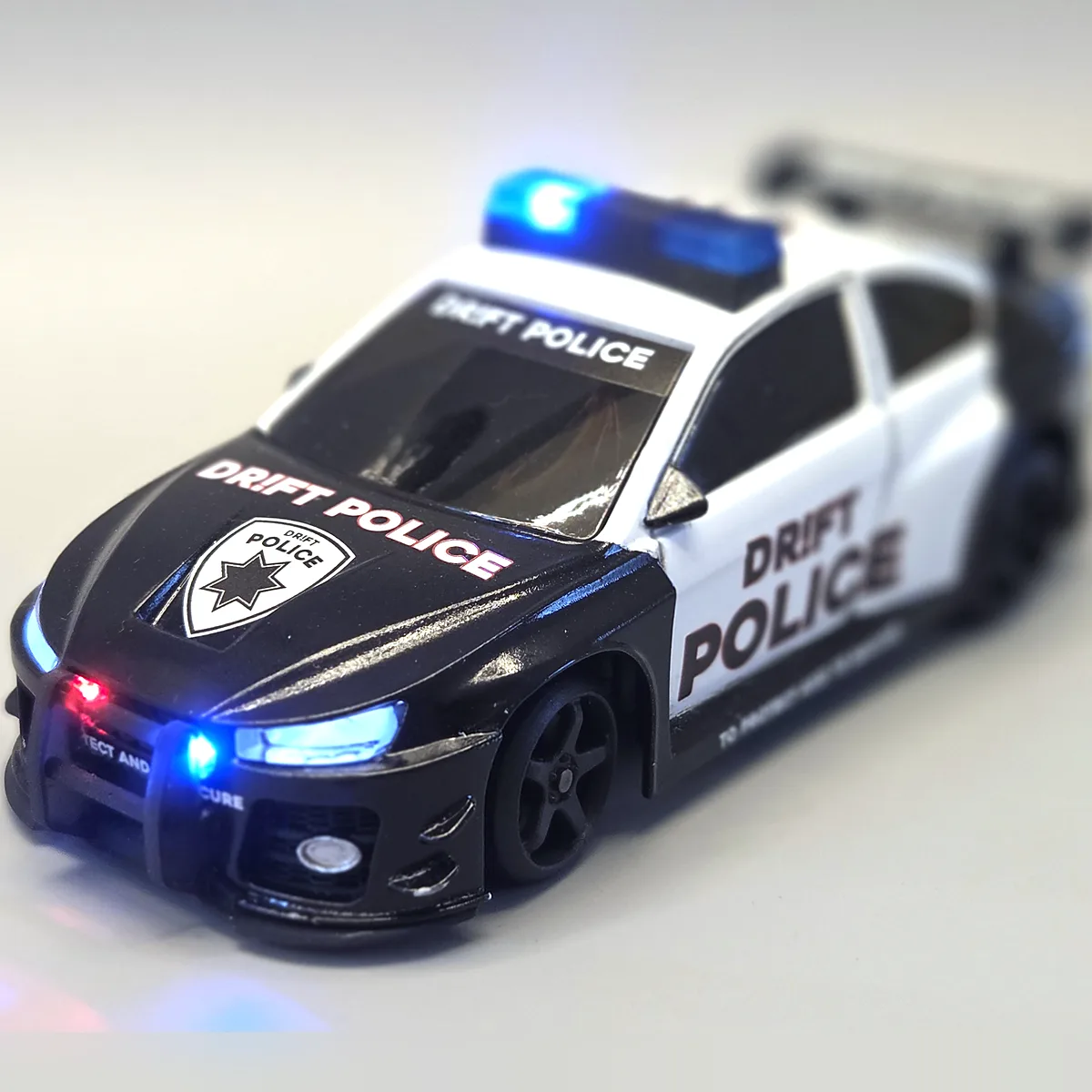Sturmkind DR!FT PoliceCar mit blauem Dachlicht und rot/blauer Front