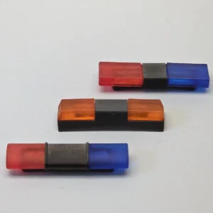 HYBRID Dachbalken in den Formen flach, eckig und oval mit roten, blauen und orangen Lichthauben